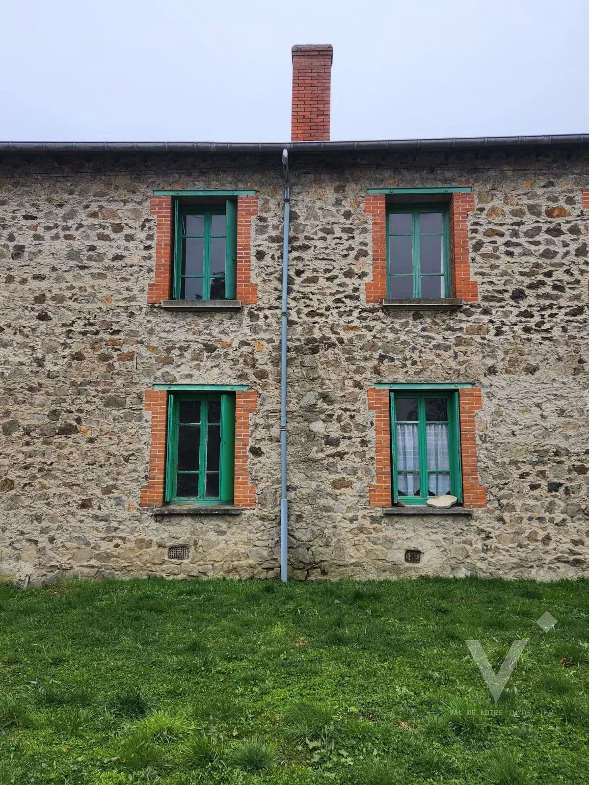 Maison mitoyenne avec terrain